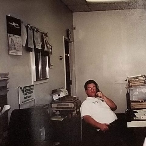 Taking an important call at Tunex in 2000.