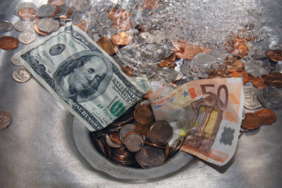 Wealth Draining Expenses - Money Going Down the Drain